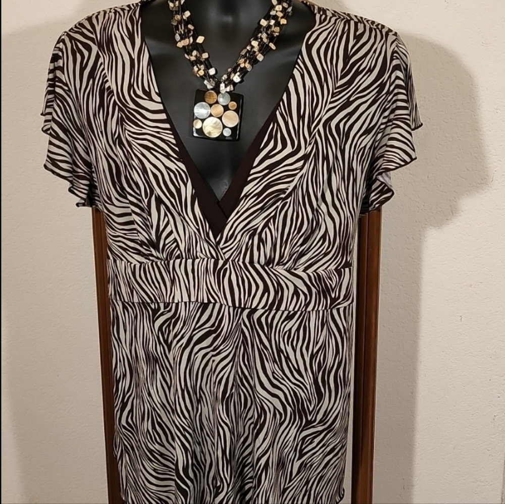Vol. 1 Woman Zebra Print Blouse (Necklace Sold Separately)